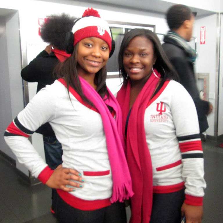 Two girls posing in their IU gear.